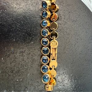 Swarovski touchstone Ice Bracelet gold tone/Montana blue stone!!!